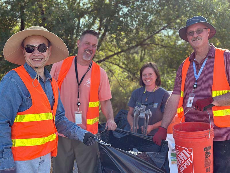 Zions employees working together on community service outside